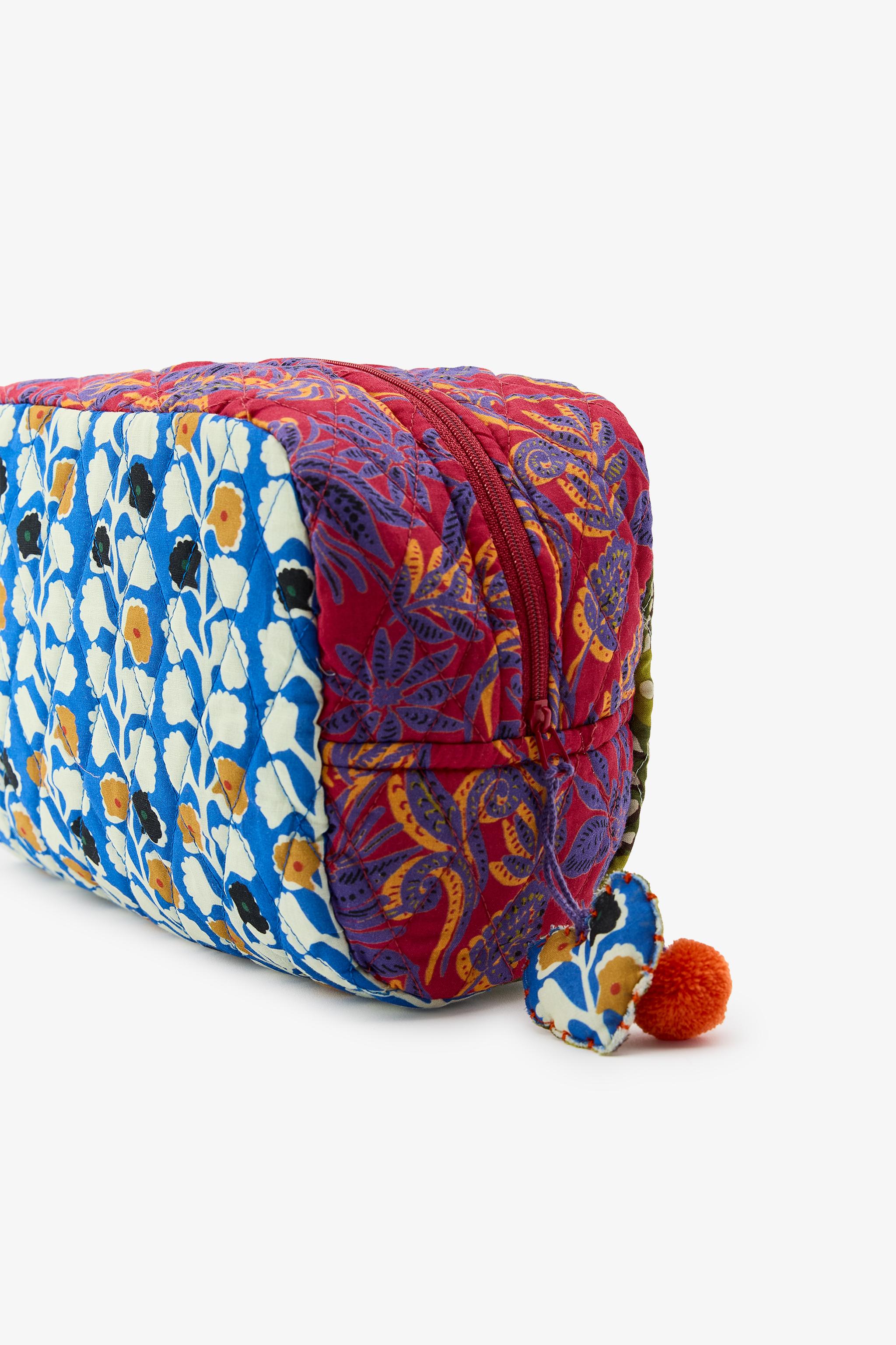 CHARM PRINT TOILETRY BAG
